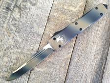 Нож Microtech Ultratech Black 121-1TC с автоматическим открытием/закрытием клинка.