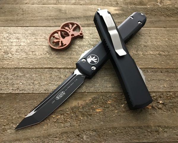 Нож Microtech Ultratech Black 123-1 с автоматическим открытием/закрытием клинка.