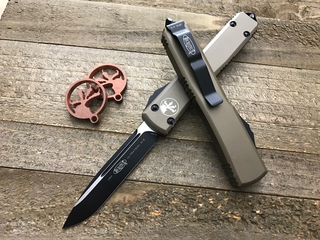Нож Microtech Ultratech Black 121-1TA с автоматическим открытием/закрытием клинка.