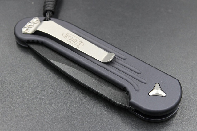 Нож Microtech LUDT 135-1 с автоматическим открытием клинка.