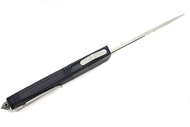 Нож Microtech Trodon Black 139-4 с автоматическим открытием/закрытием клинка.