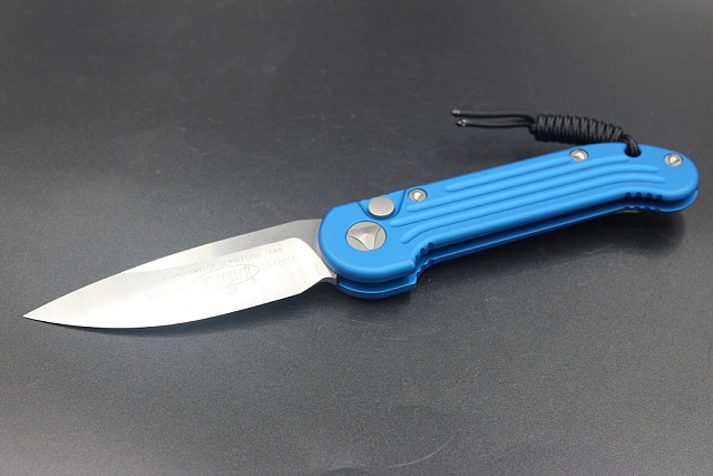 Нож Microtech LUDT 135-4BL c автоматическим открытием клинка.